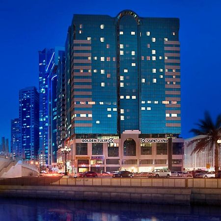 Golden Tulip Sharjah Aparthotel Bagian luar foto