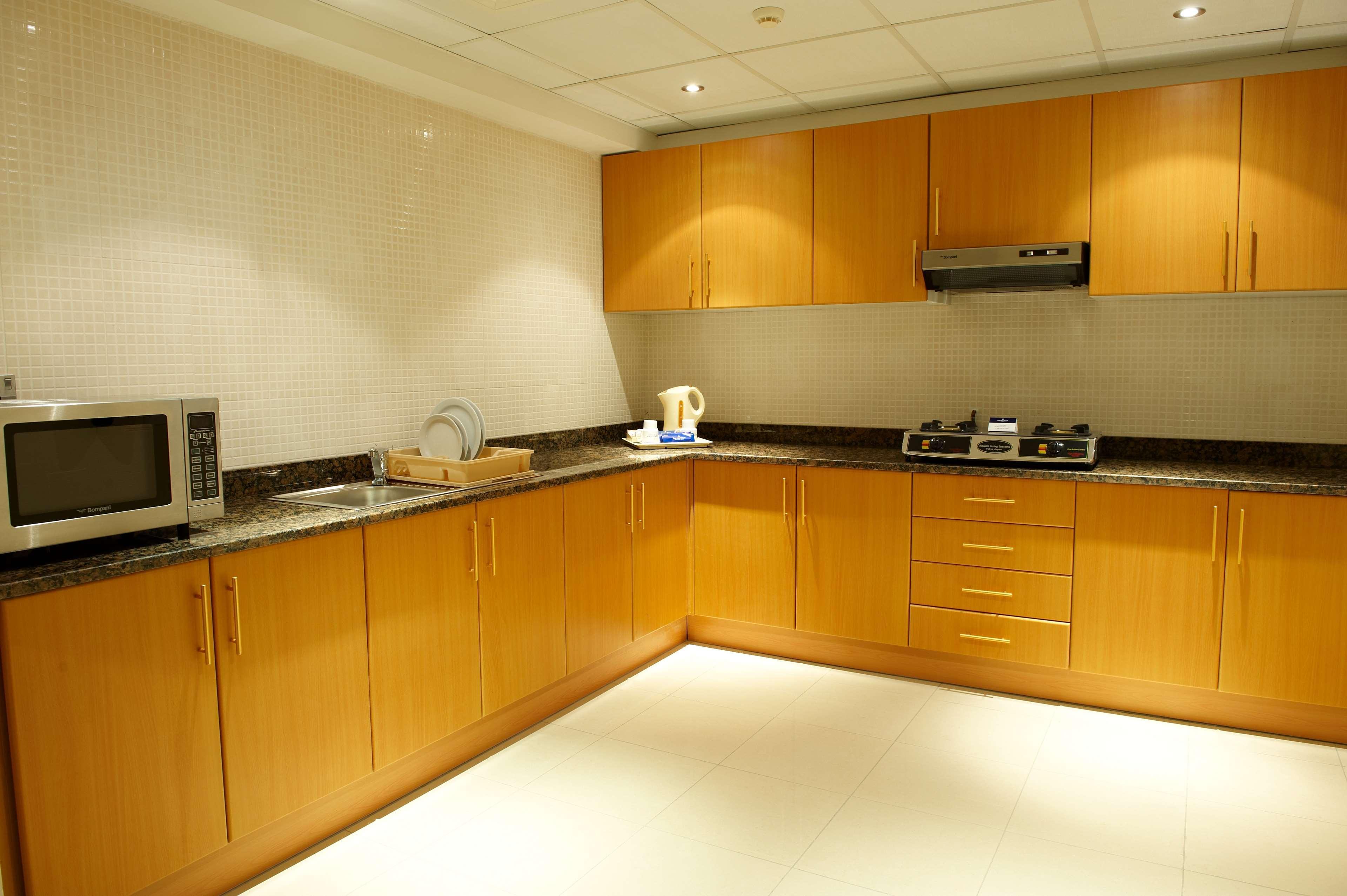 Golden Tulip Sharjah Aparthotel Bagian luar foto