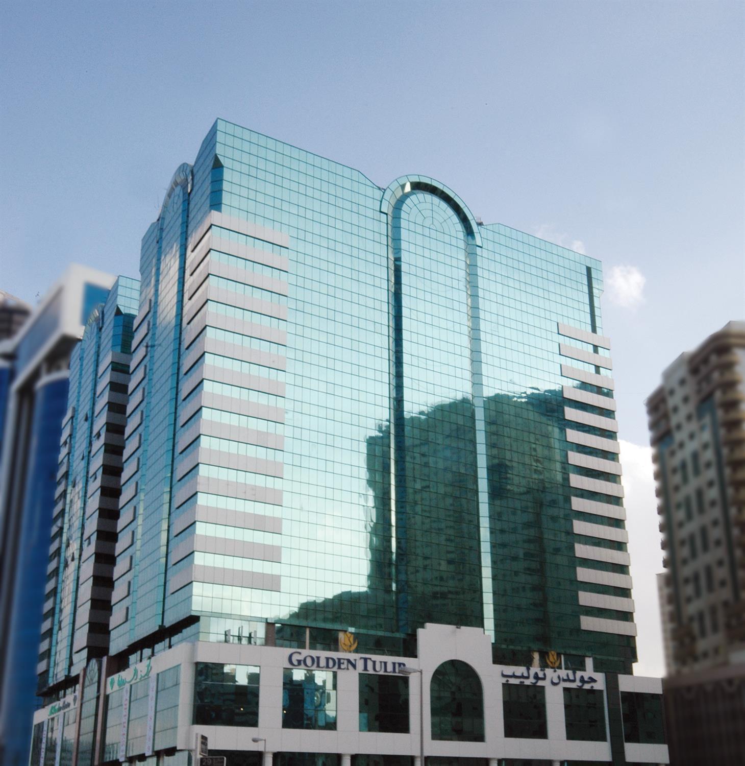 Golden Tulip Sharjah Aparthotel Bagian luar foto